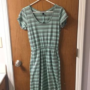 Long teal short sleeve dress with pockets.